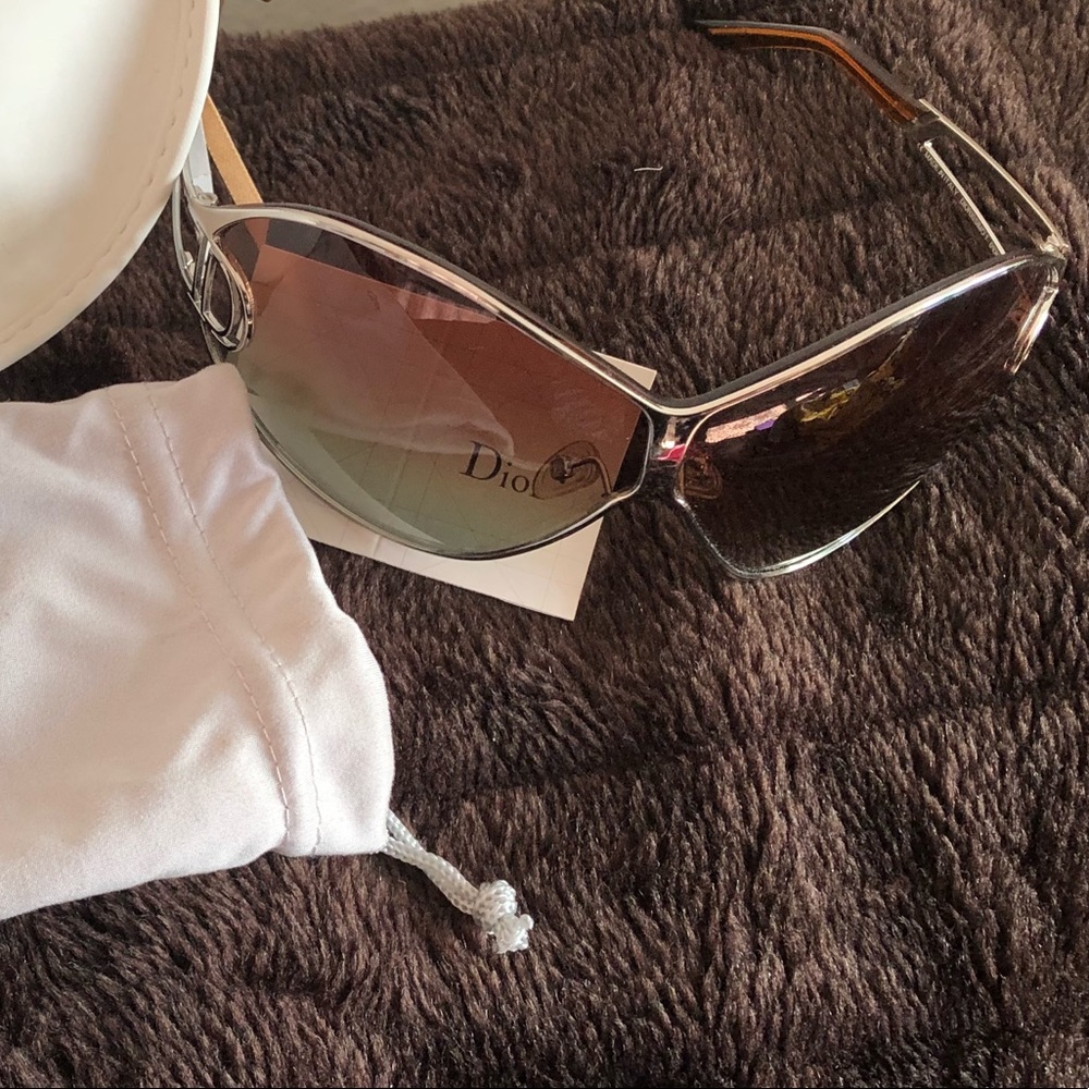 Authentic Dior Sunglasses with Card Case & Pouch. The case has yellow stains